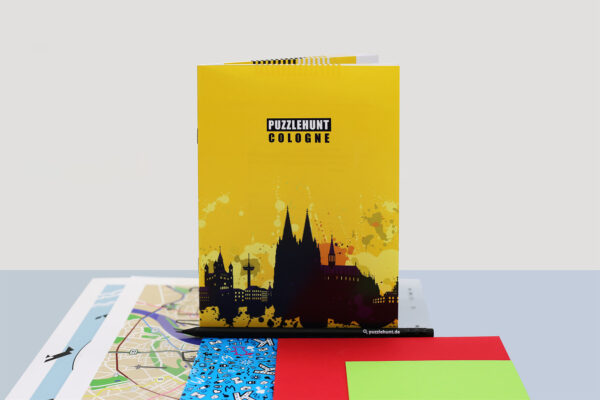 Produktbild Puzzlehunt Cologne Rätseltour, Broschüre und Inhalt des Spiel-Kits